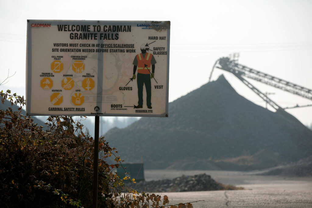A safety sign greets people as they enter the Cadman, Inc. sand and gravel mine on Monday, in Granite Falls. (Ryan Berry / The Herald) 
