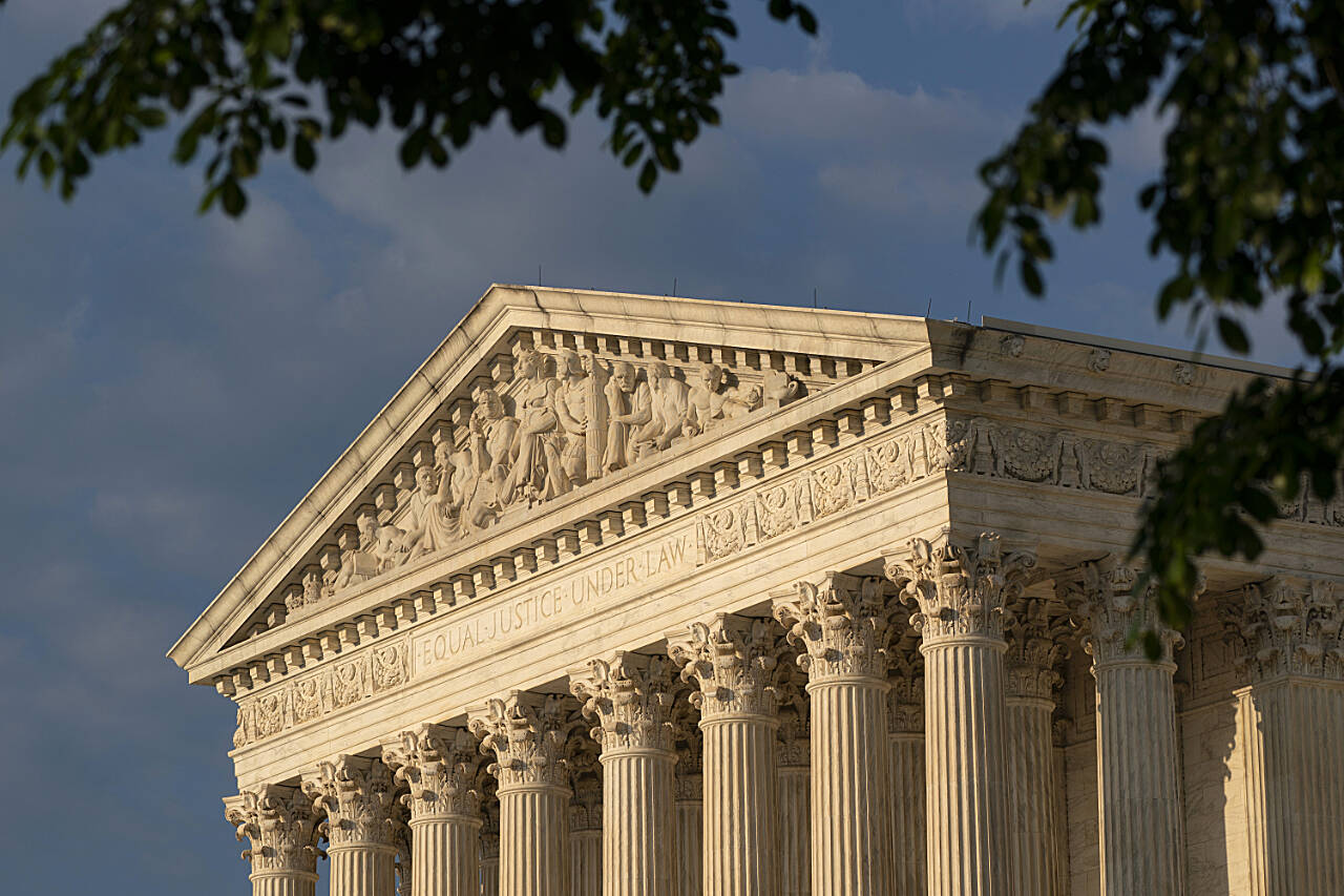 The U.S. Supreme Court building is shown on May 4, in Washington, D.C. The Supreme Court says it will continue providing live audio broadcasts of arguments in cases, even as it welcomes the public back to its courtroom for a new term that begins Monday. (Alex Brandon / Associated Press File)