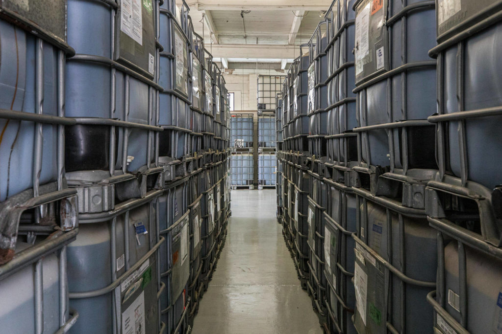 Containers of vanadium electrolyte. (Dan DeLong / InvestigateWest)
