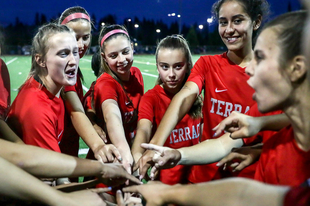 The Mountlake Terrace Hawks rally before the match against Archbishop Murphy Thursday night at Lynnwood High School in Lynnwood, Washington on September 22, 2022. The Hawks and Wildcats finished the match with 1-1 tie. (Kevin Clark / The Herald)