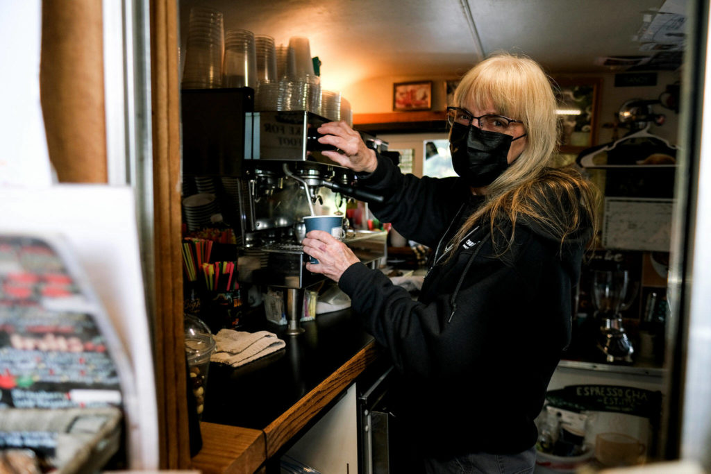 Sandy Klein steams a coffee drink at Espresso Chalet in Gold Bar on Sept. 27. (Taylor Goebel / The Herald)
