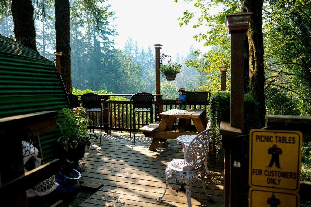 The view from Espresso Chalet’s deck in Gold Bar was still hazy from the Bolt Creek Fire on Sept. 27. (Taylor Goebel / The Herald)
