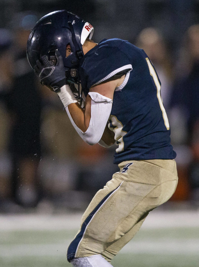 Arlington’s Neil Carroll reacts to a missed catch during the Stilly Cup against Stanwood on Friday, Sept. 30, 2022 in Arlington, Washington. (Olivia Vanni / The Herald)
