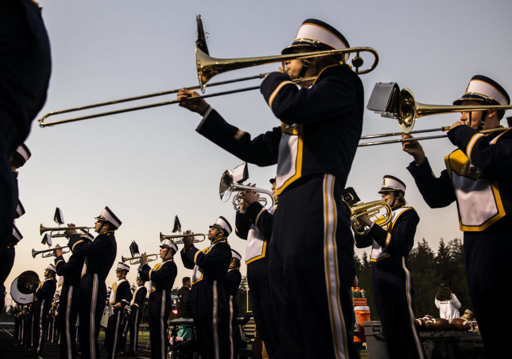 The Arlington marching band performs the National Anthem before the Stilly Cup on Friday, Sept. 30, 2022 in Arlington, Washington. (Olivia Vanni / The Herald)
