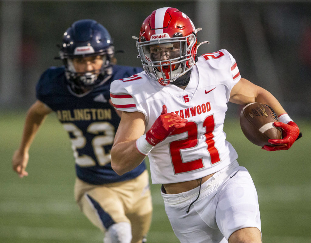 Otto Wiedmann was part of a Stanwood Wing-T attack that piled up 507 total yards. (Olivia Vanni / The Herald)
