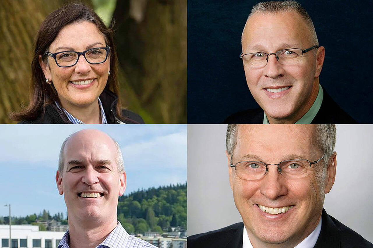 Top: Suzan DelBene, left, and Vincent Cavaleri. Bottom: Rick Larsen, left, and Dan Matthews.