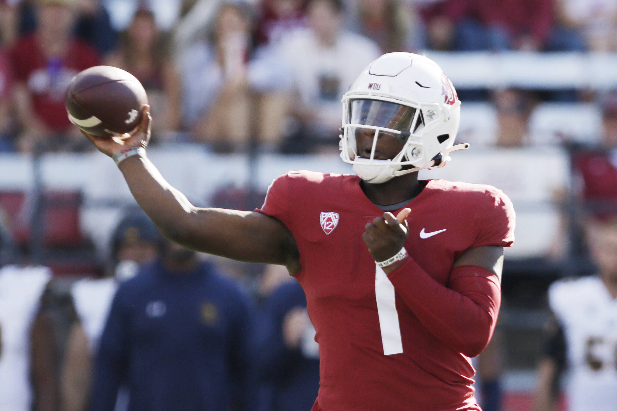 Washington State quarterback Cameron Ward throws a pass during the first half of a game against California on Saturday in Pullman. (AP Photo/Young Kwak)