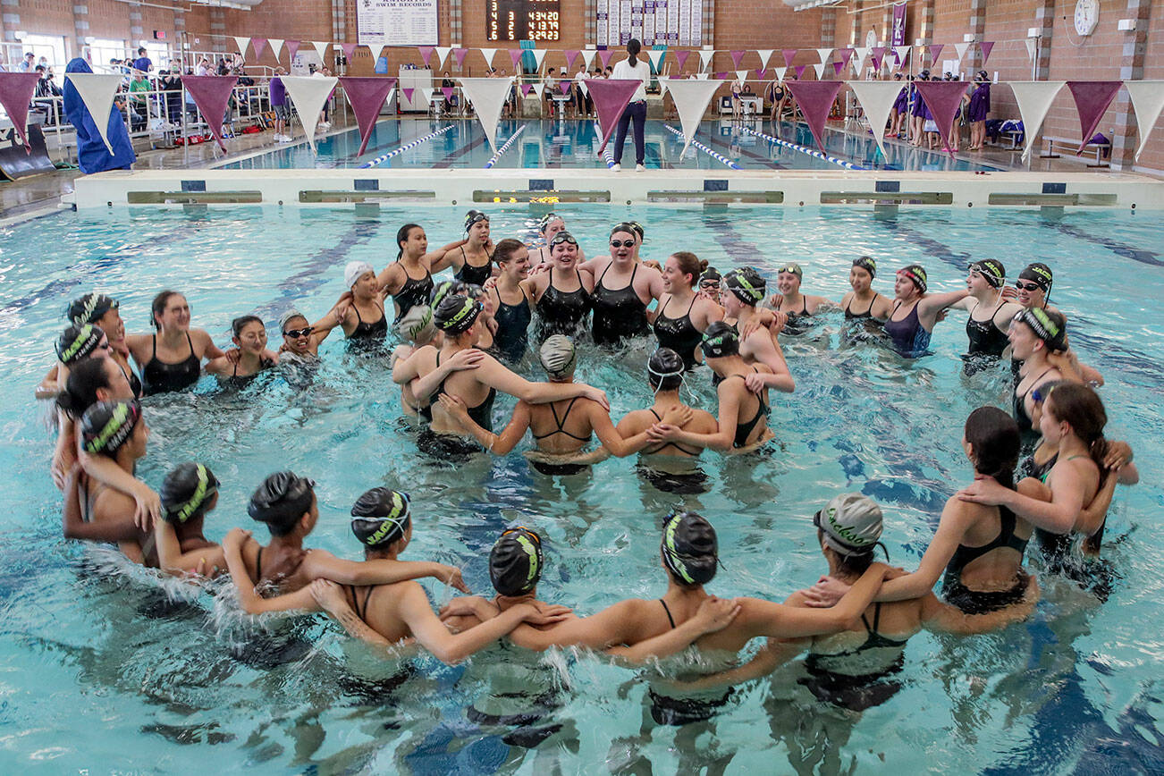 Jackson rallies before the start of meet against Kamiak Thursday afternoon at Kamiak High School in Mukilteo, Washington on October 6, 2022.  (Kevin Clark / The Herald)