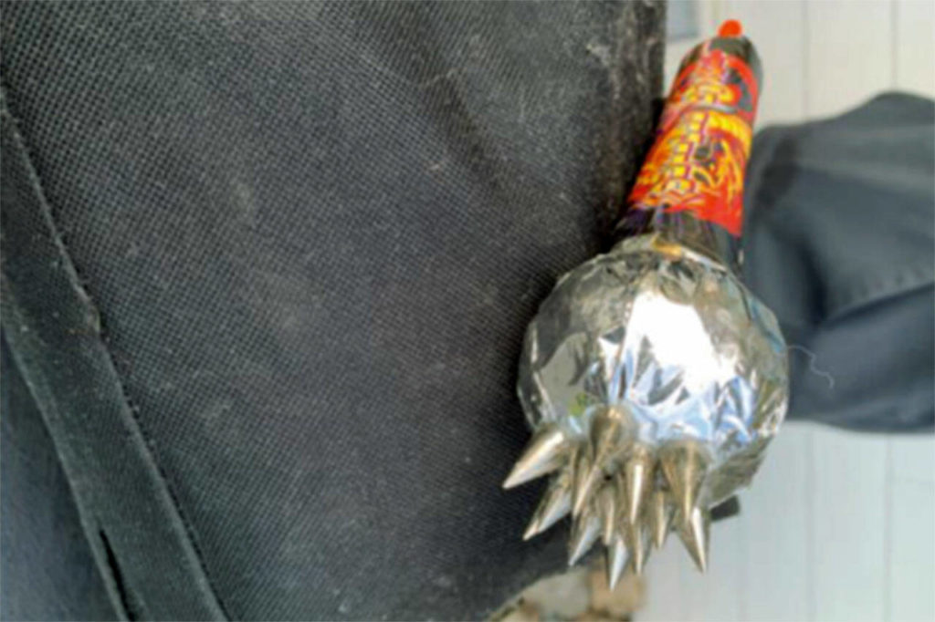 A cylindrical firework wrapped in spikes was reportedly among several modified into homemade bombs. (U.S. Attorney’s Office)
