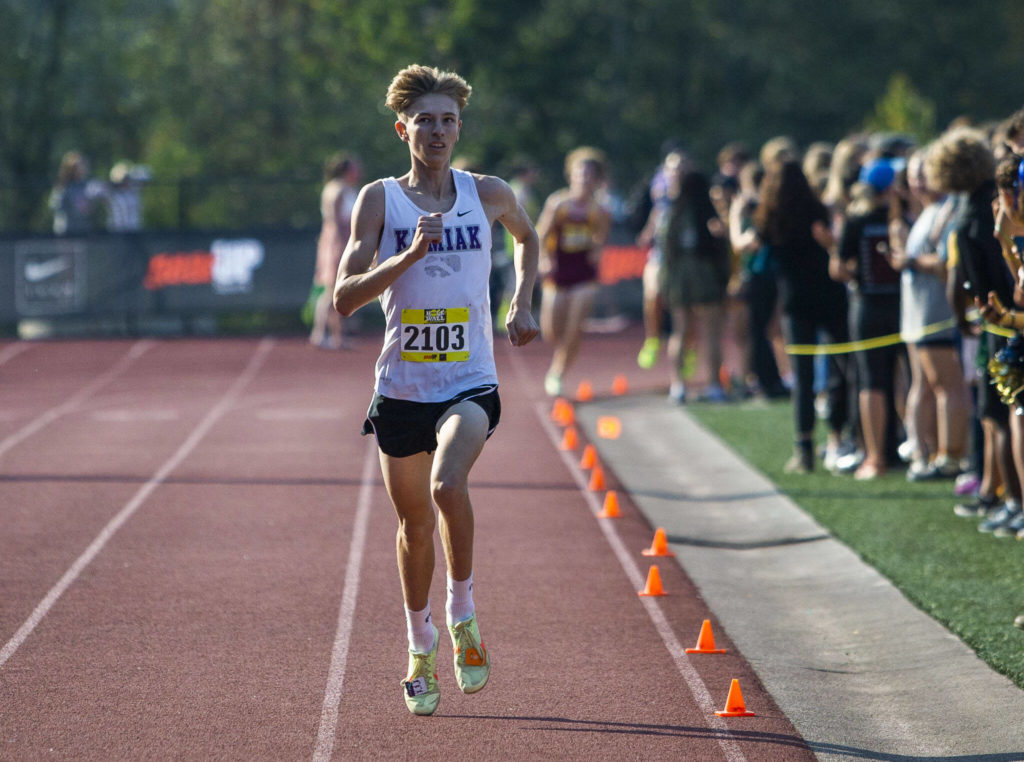 Kamiak senior Jaedyn Chase broke the 16-minute mark and placed fourth in the boys gold race. (Olivia Vanni / The Herald)
