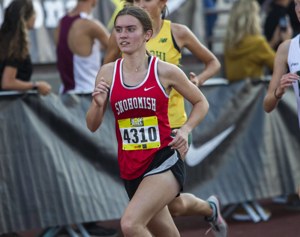 Snohomish’s Paige Gerrard runs their first lap in the girls elite race at the Hole In The Wall Invitational on Saturday, Oct. 8, 2022 in Arlington, Washington. (Olivia Vanni / The Herald)
