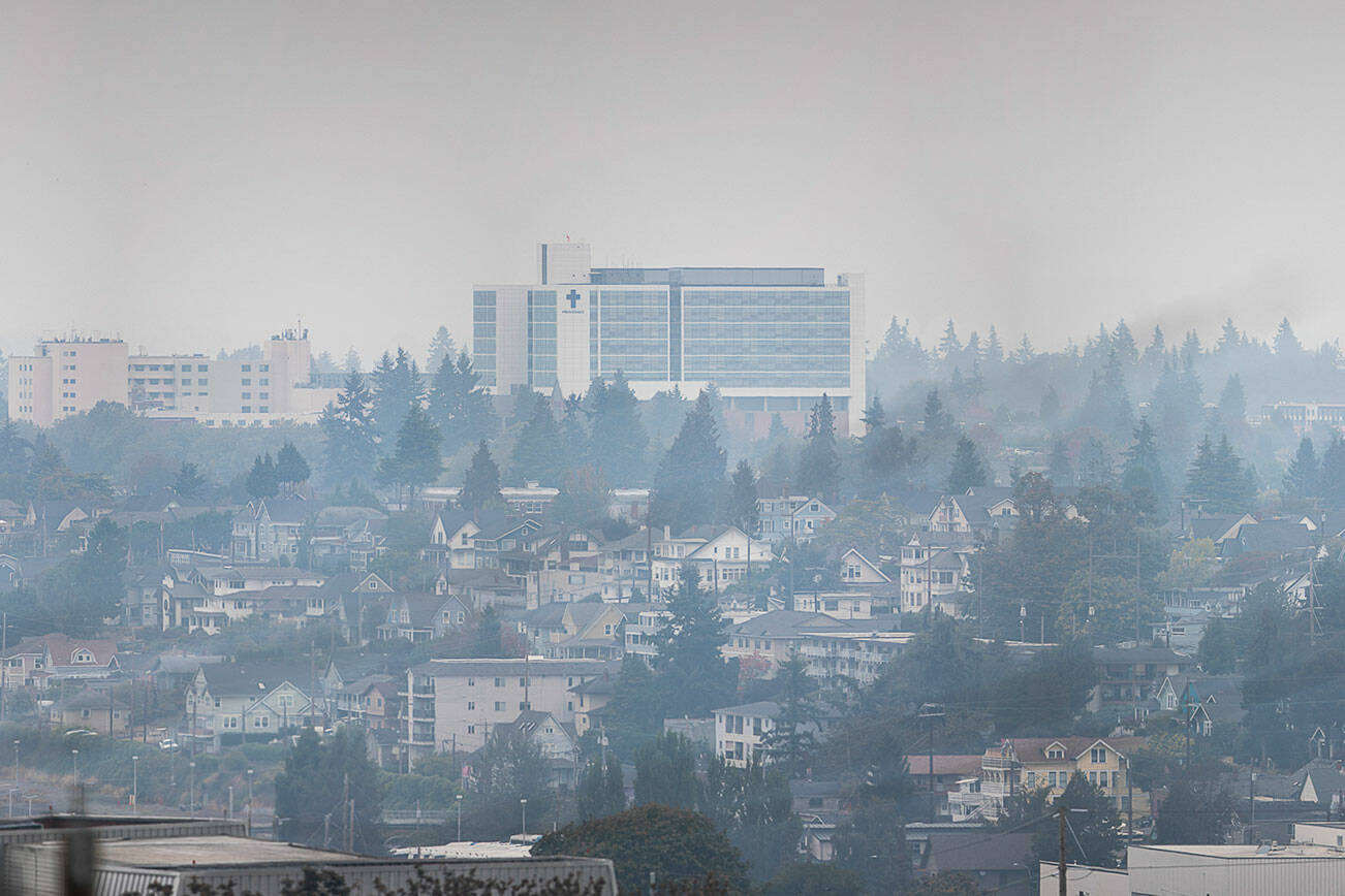 Smoke settles in over Everett on Monday, Oct. 10, 2022 in Everett, Washington. (Olivia Vanni / The Herald)