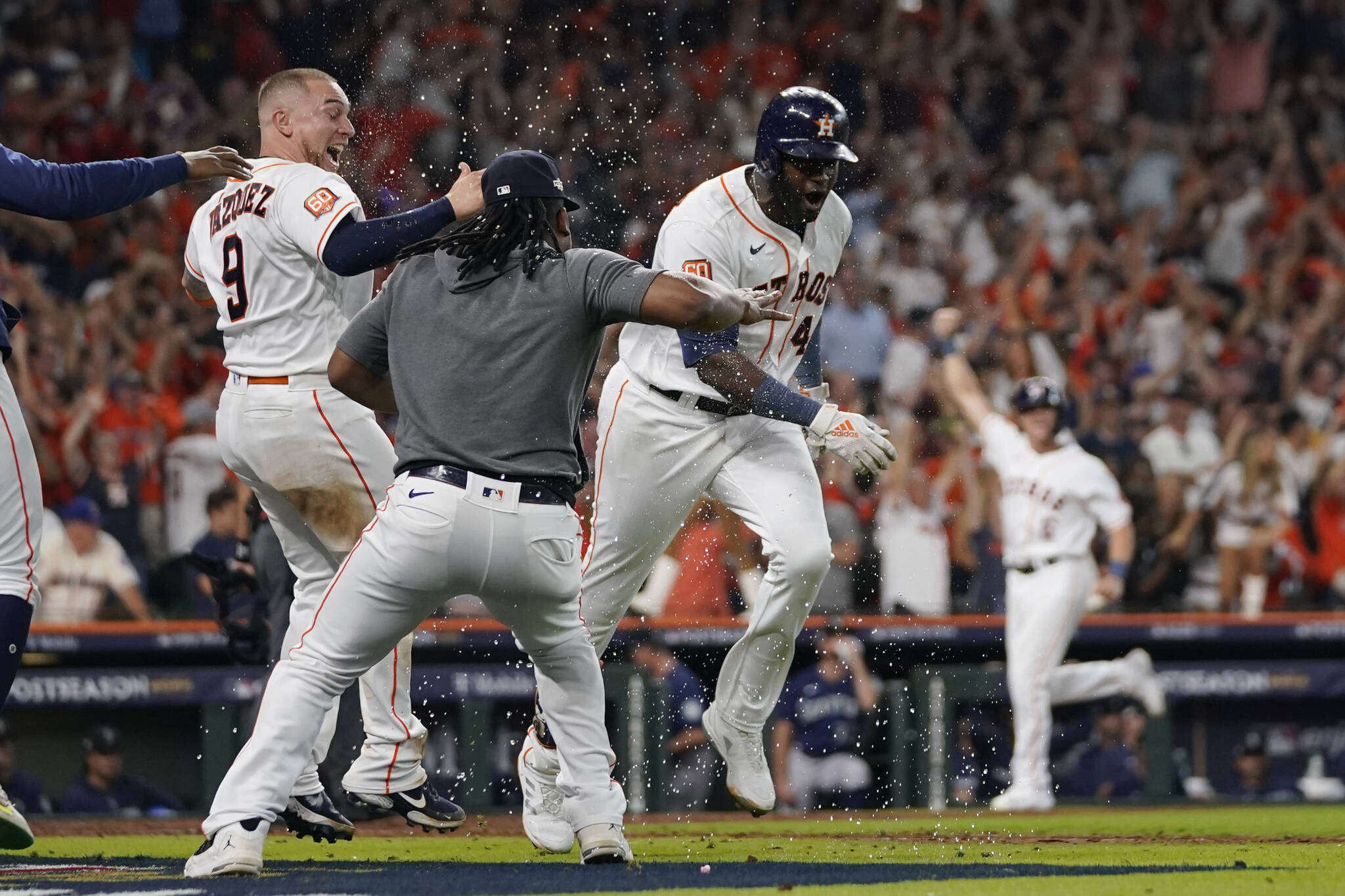 Astros designated hitter Yordan Alvarez (44) celebrates with teammates after his three-run, walk-off home run against the Mariners during the ninth inning of Game 1 of an American League Division Series game on Tuesday in Houston. (AP Photo/David J. Phillip)