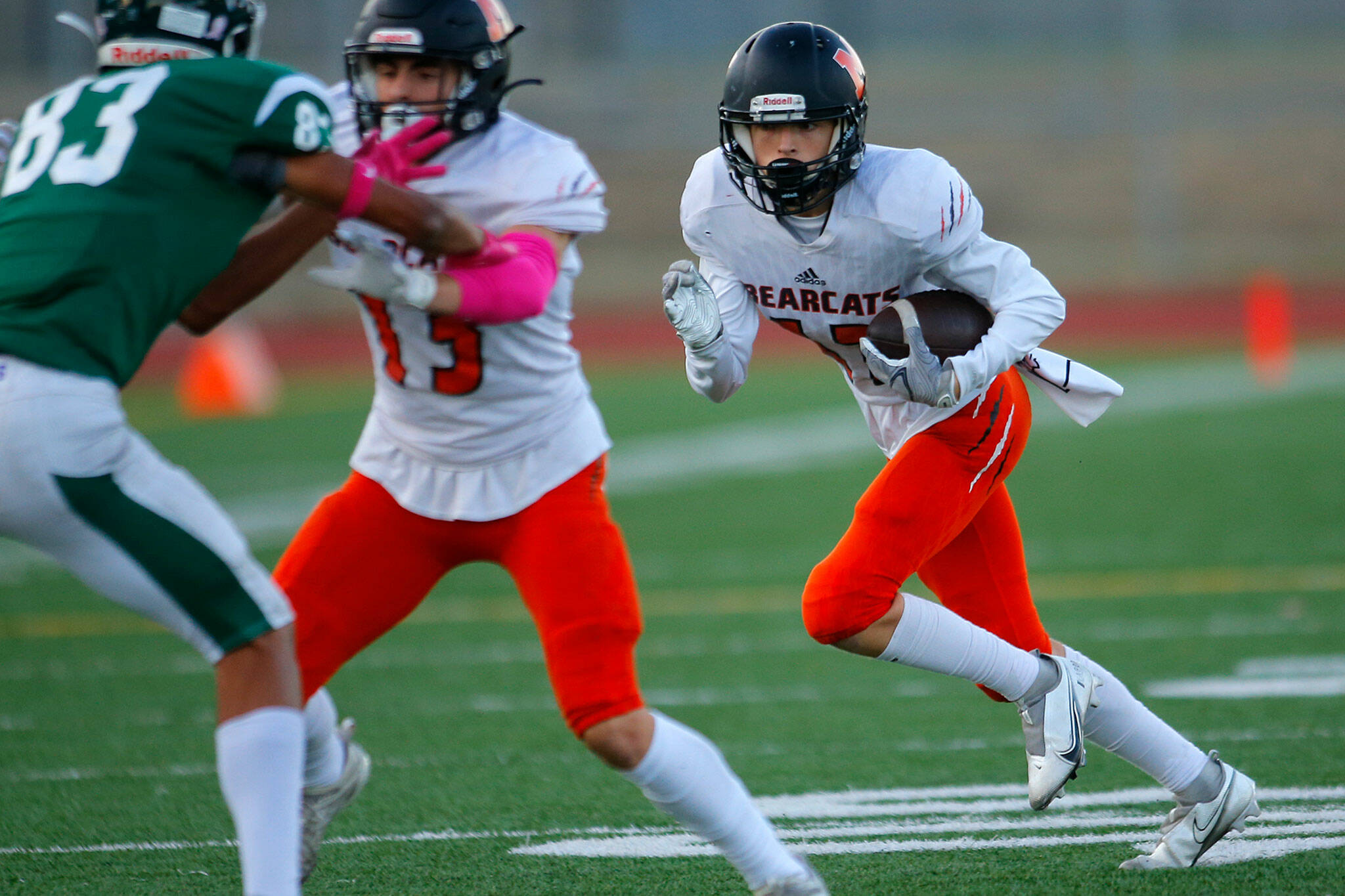 Monroe’s Aidan Gamble turns upfield after a short reception against Edmonds-Woodway on Friday at Edmonds Stadium. (Ryan Berry / The Herald)