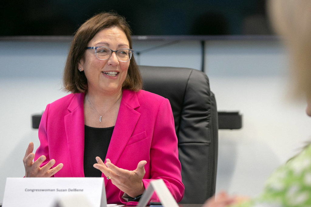 U.S. Rep. Suzan DelBene leads a discussion on the shortage of baby formula during a visit Thursday, at the Volunteers of America food distribution center in Arlington. (Ryan Berry / The Herald)
