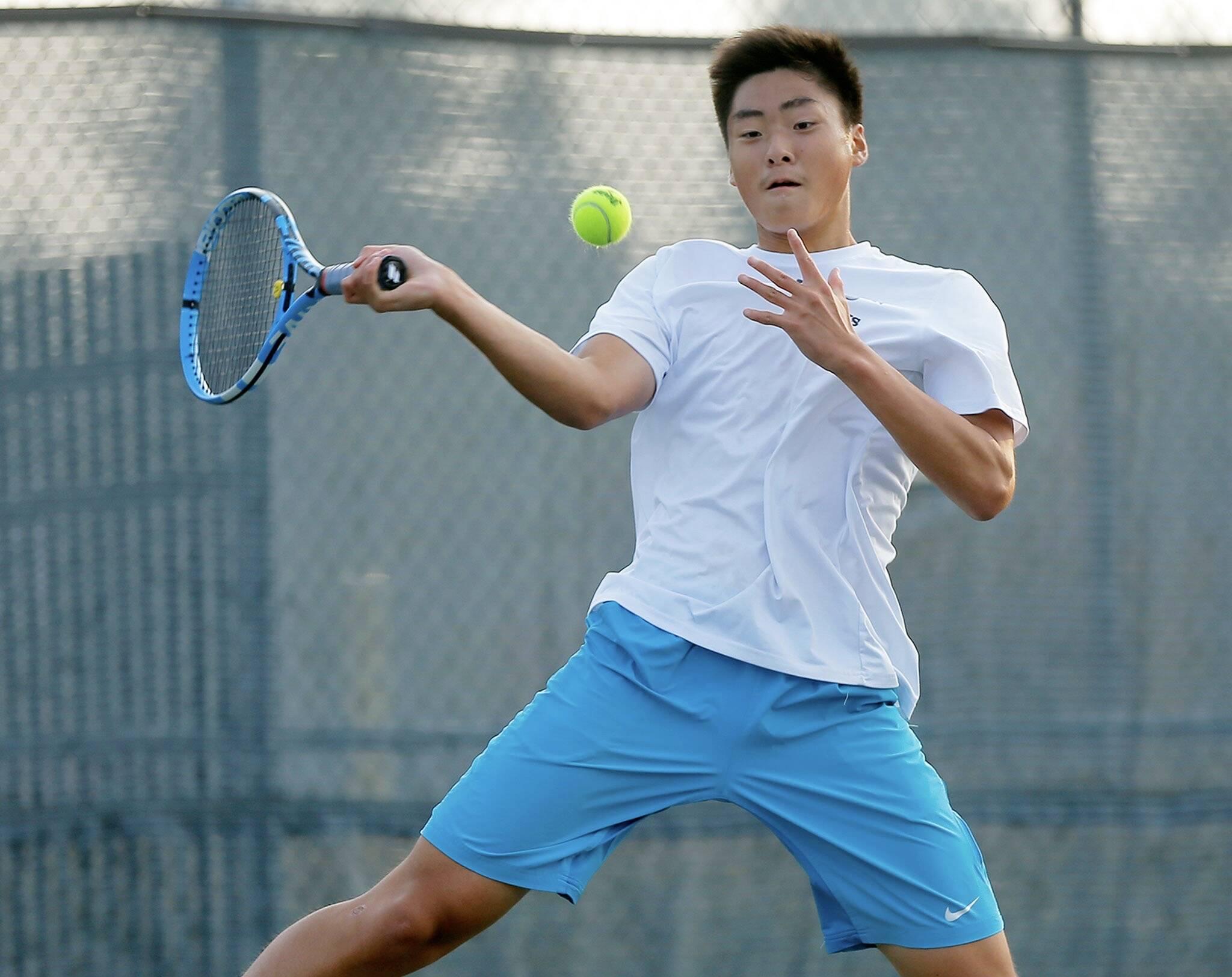 Jackson sophomore Ben Lee cruised to the Class 4A District 1 singles title as part of a dominant showing by the Timberwolves’ star trio. (Ryan Berry / The Herald)