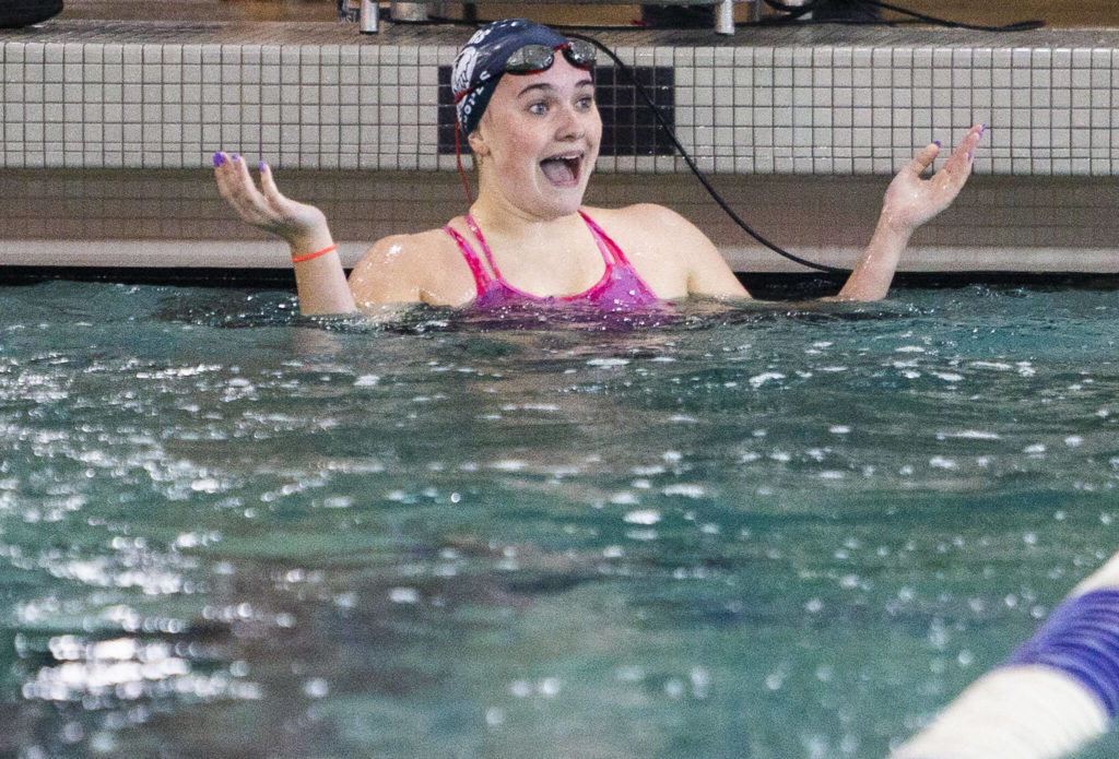 Glacier Peak’s Isabella Hopes reacts to winning the 200 Yard IM during the meet against Snohomish on Tuesday, Oct. 18, 2022 in Snohomish, Washington. (Olivia Vanni / The Herald)
