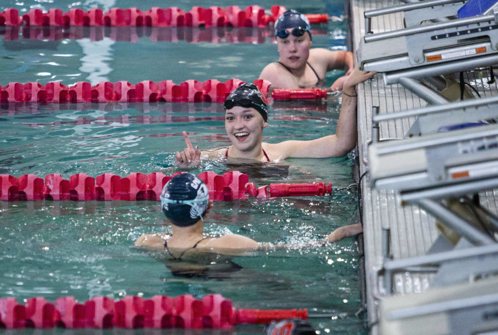 Snohomish’s Lauren Peterson reacts to her time after finishing the 500 Yard Freestyle on Tuesday, Oct. 18, 2022 in Snohomish, Washington. (Olivia Vanni / The Herald)
