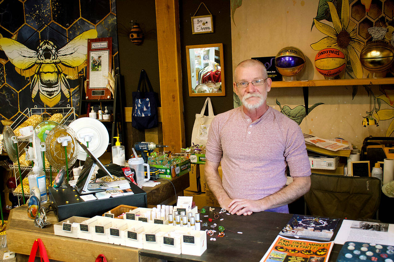Casey Burr is the owner of Hive Jive, a new Oak Harbor business that sells local vendors goods, along with the honey he makes. (Rachel Rosen / Whidbey News-Times)