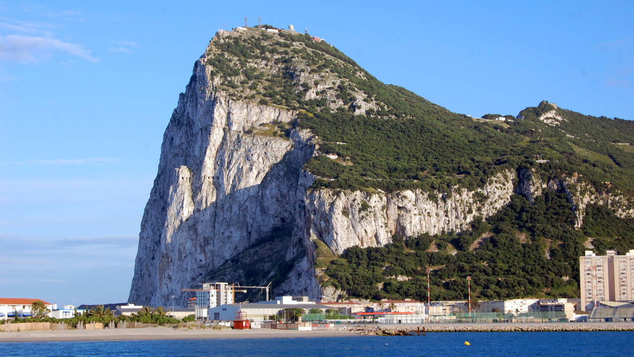 The craggy, famous Rock of Gibraltar overlooks its namesake town below.