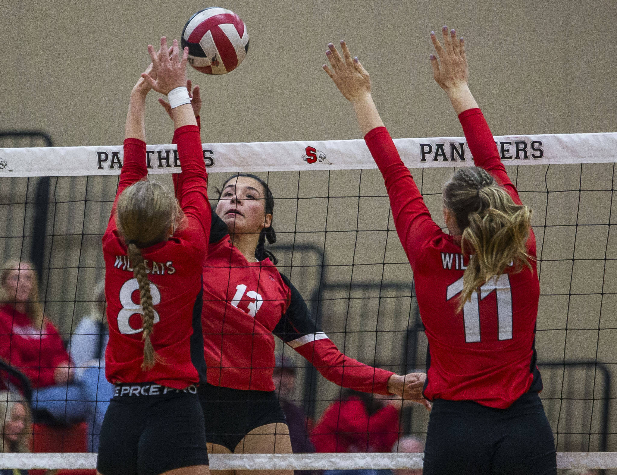 Snohomish’s Adriannah Galvan tips the ball past Archbishop Murphy’s Natalie Russell during the match on Wednesday, Oct. 19, 2022 in Snohomish, Washington. (Olivia Vanni / The Herald)