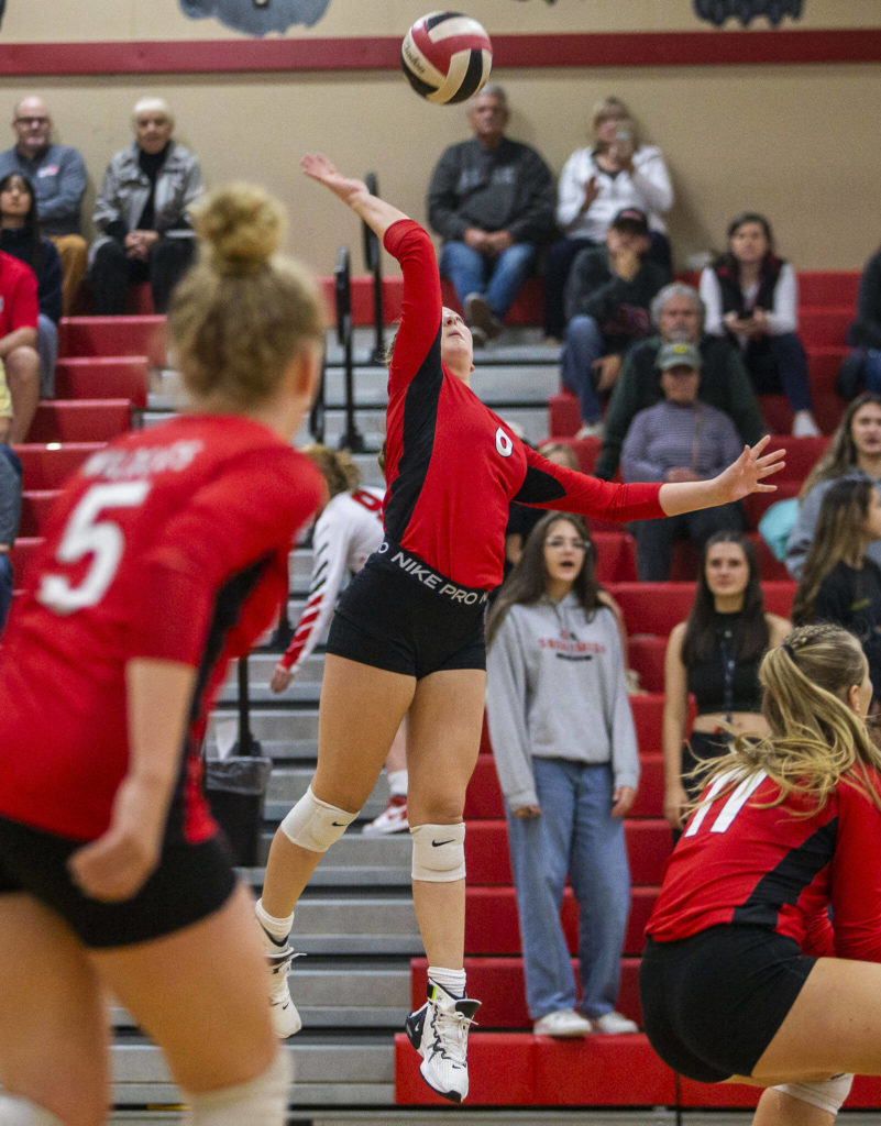 Archbishop Murphy’s Tatum Gill spikes the ball during the match against Snohomish on Wednesday, Oct. 19, 2022 in Snohomish, Washington. (Olivia Vanni / The Herald)
