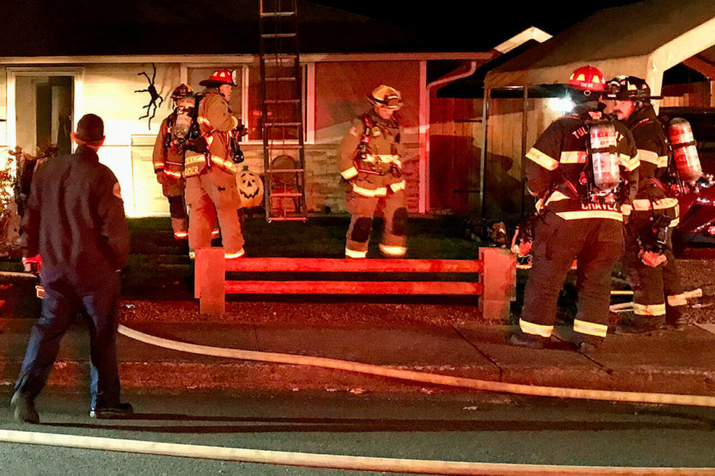 Fire authorities responded to a house fire Thursday night that injured three residents in Marysville. (Marysville Fire District)
