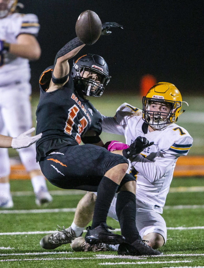 Monroe’s Eli Miller fumbles a pass during the game against Ferndale on Friday, Oct. 28, 2022 in Monroe, Washington. (Olivia Vanni / The Herald)

