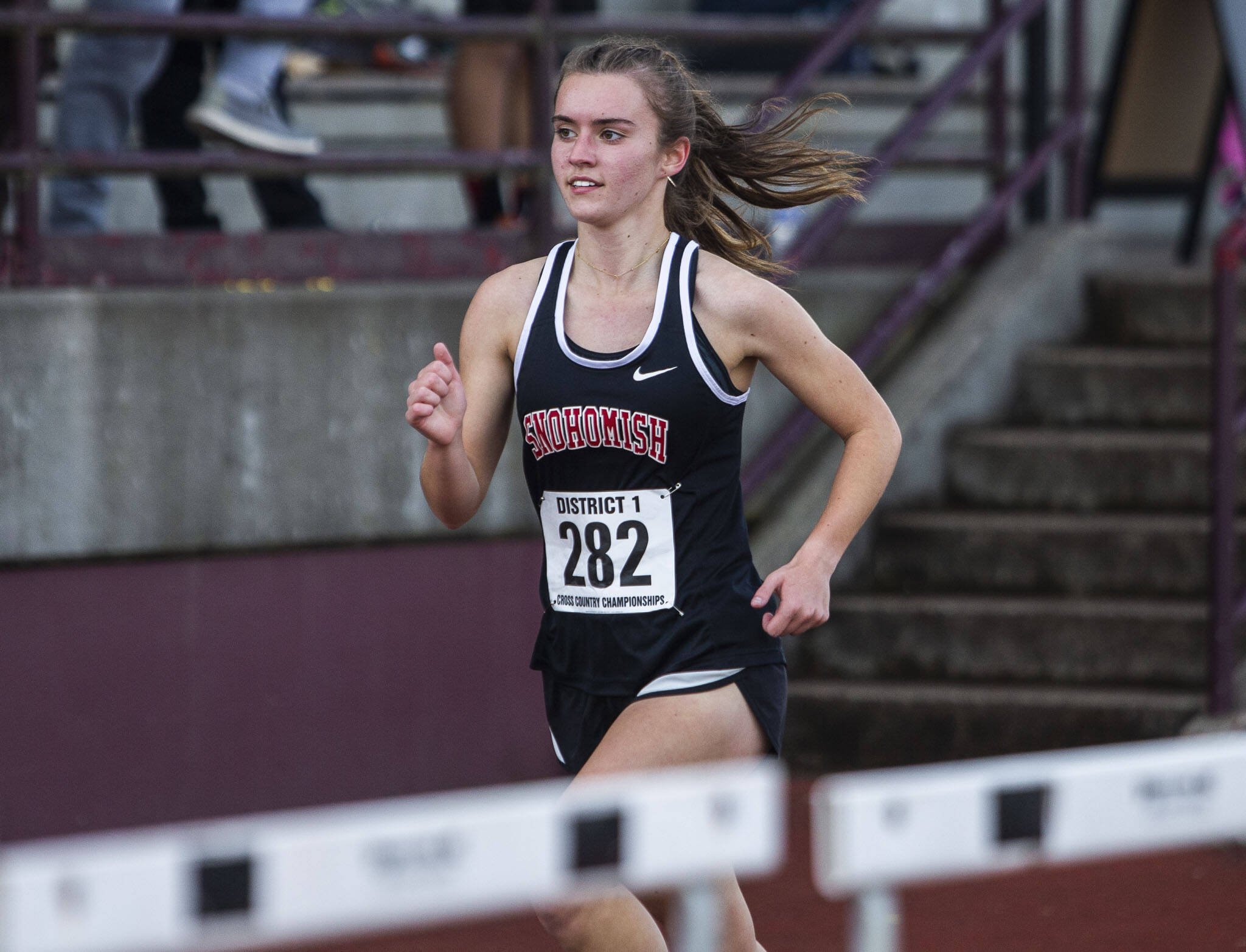 Snohomish’s Paige Gerrard leads halfway through the 3A Girls District Cross Country championship race on Saturday, Oct. 29, 2022 in Arlington, Washington. (Olivia Vanni / The Herald)