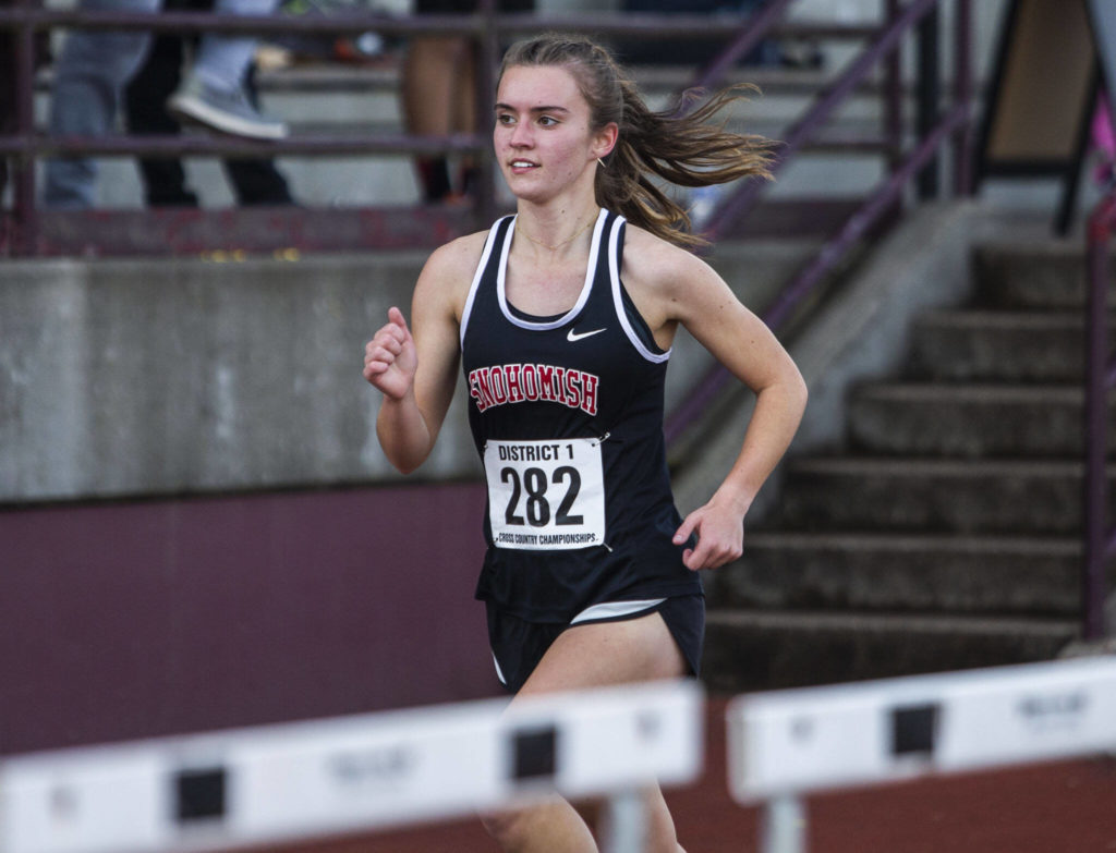 Snohomish’s Paige Gerrard leads halfway through the 3A Girls District Cross Country championship race on Saturday, Oct. 29, 2022 in Arlington, Washington. (Olivia Vanni / The Herald)
