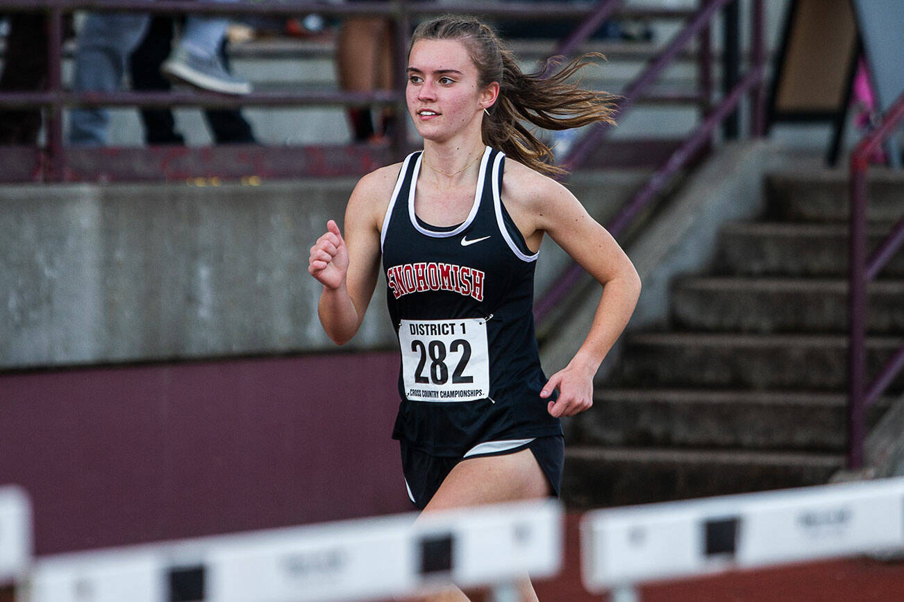 Snohomish’s Paige Gerrard leads halfway through the 3A Girls District Cross Country championship race on Saturday, Oct. 29, 2022 in Arlington, Washington. (Olivia Vanni / The Herald)