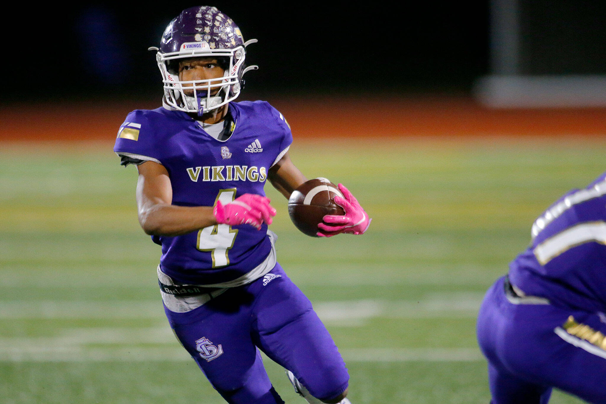 Lake Stevens wideout Cassidy Bolong-Banks turns upfield on his way to a long score against Glacier Peak on Friday at Lake Stevens High School in Lake Stevens. (Ryan Berry / The Herald)