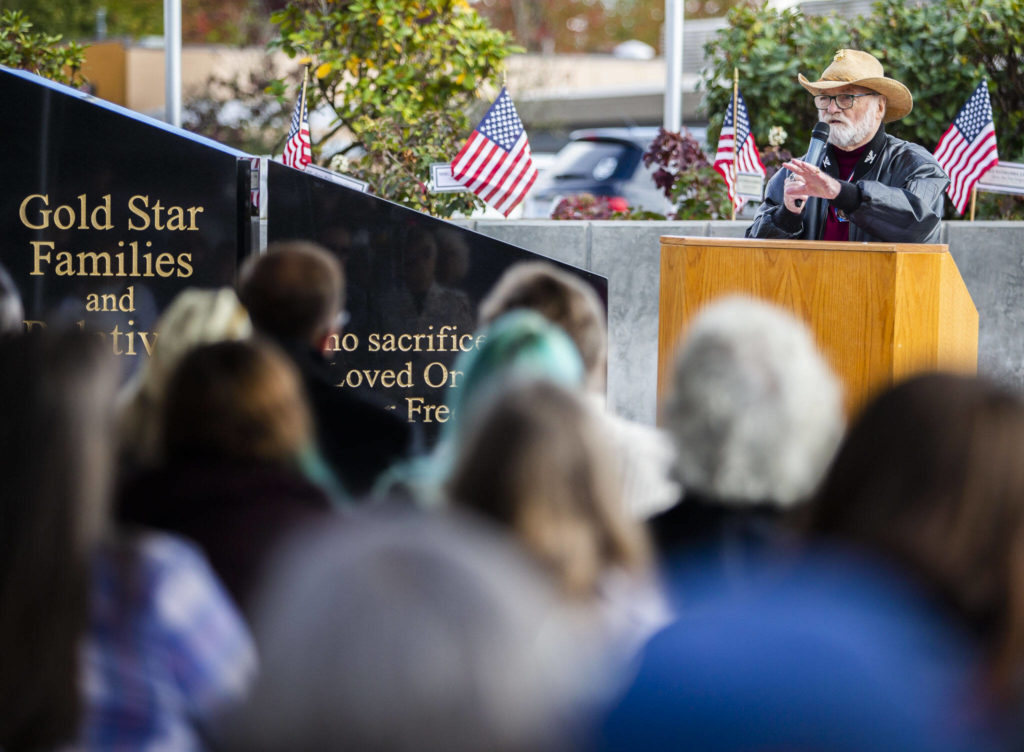Vietnam Combat Veteran Michael Reagan speaks to those gathered at the dedication ceremony for the new Gold Star Families Memorial Monument on Wednesday, in Lynnwood. (Olivia Vanni / The Herald)
