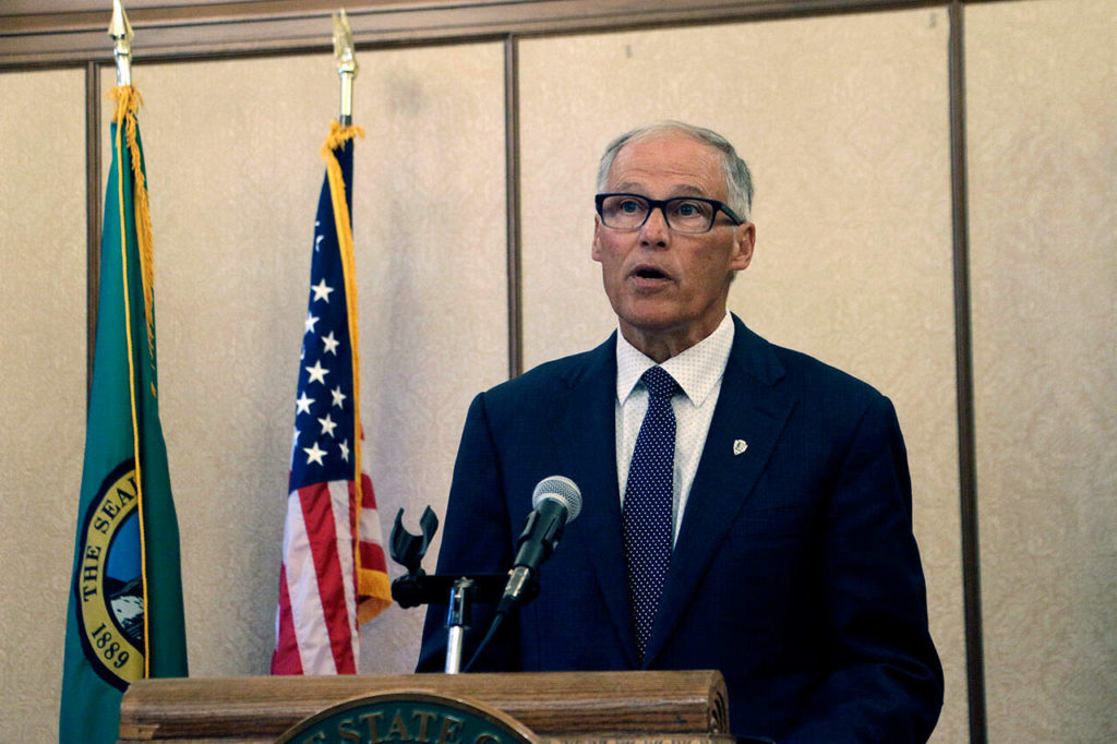 Gov. Jay Inslee announces during a news conference in Olympia, on Sept. 8, that the state of emergency sparked by the COVID-19 pandemic will end Oct. 31, nearly three years after the Democratic governor first issued the order. (AP Photo / Rachel La Corte) 
