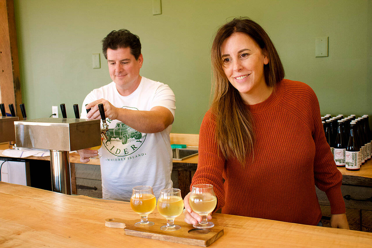 Jeff Stoner, left, and Kim Taylor co-own Greenbank Cidery which recently opened a tasting a room in Coupeville. (Rachel Rosen / Whidbey News-Times)