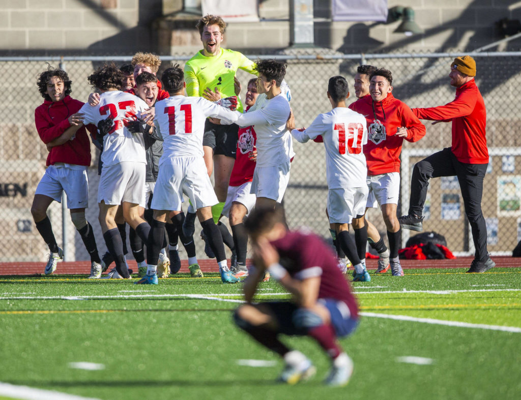 Everett Community College players celebrate a goal in the final minutes to tie the game against Whatcom on Sunday, Oct. 23, 2022, in Everett. (Olivia Vanni / The Herald)
