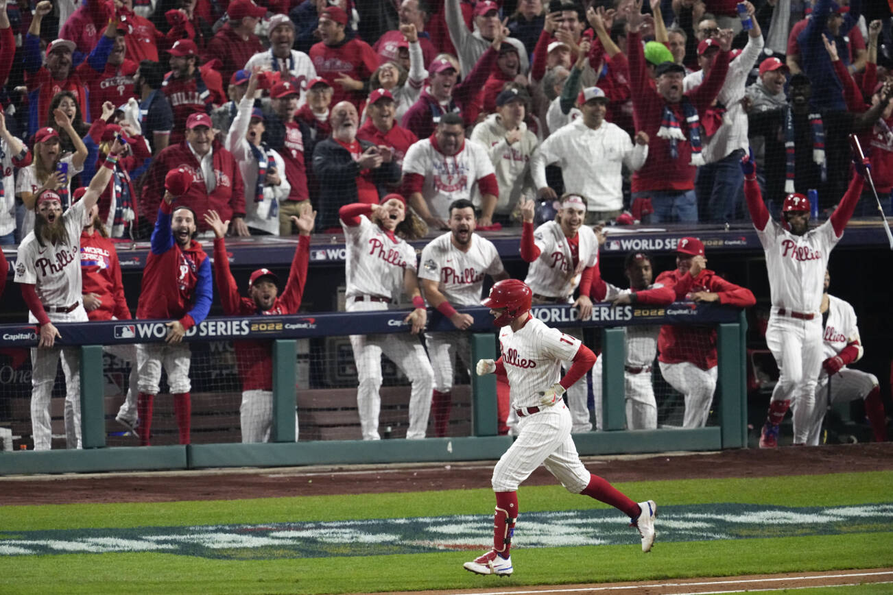 Philadelphia Phillies' Kyle Schwarber rounds the bases after a two-run home run during the fifth inning in Game 3 of baseball's World Series between the Houston Astros and the Philadelphia Phillies on Tuesday, Nov. 1, 2022, in Philadelphia. (AP Photo/Matt Rourke)