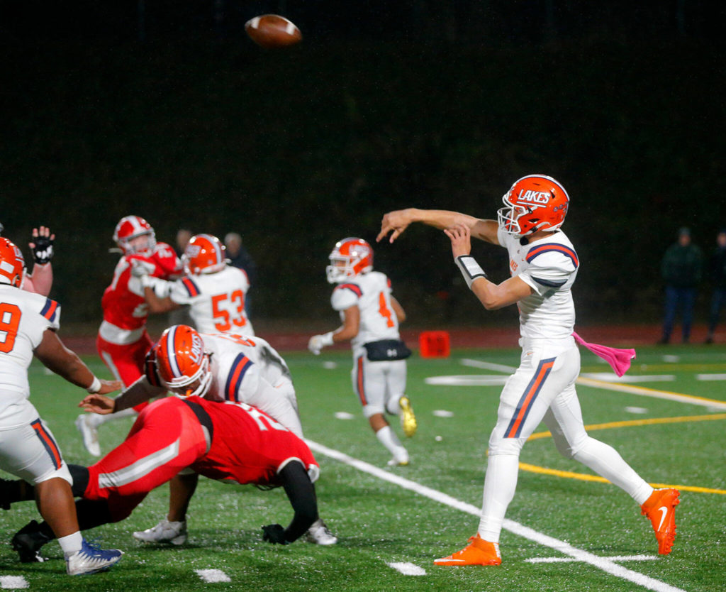 Lakes’ Legend Galeai takes a shot downfield against Stanwood on Friday, Nov. 4, 2022, at Stanwood High School in Stanwood, Washington. (Ryan Berry / The Herald)
