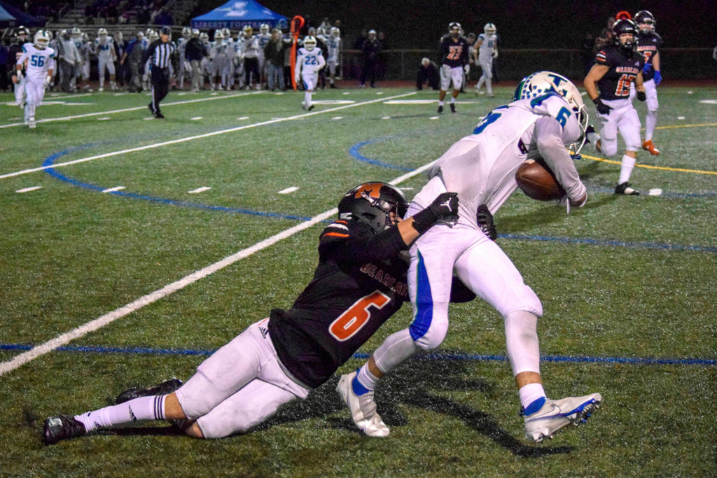 Monroe junior Deegan Chapman tackles Liberty’s Jaxson Thoresen on Friday, Nov. 4, 2022 in Monroe, Washington.
