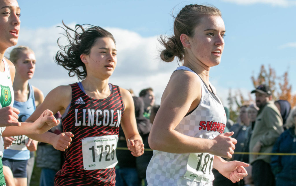 Snohomish junior Paige Gerrard (right) placed fourth in the 3A girls race to earn her second consecutive state medal. (TJ Mullinax / For The Herald)

