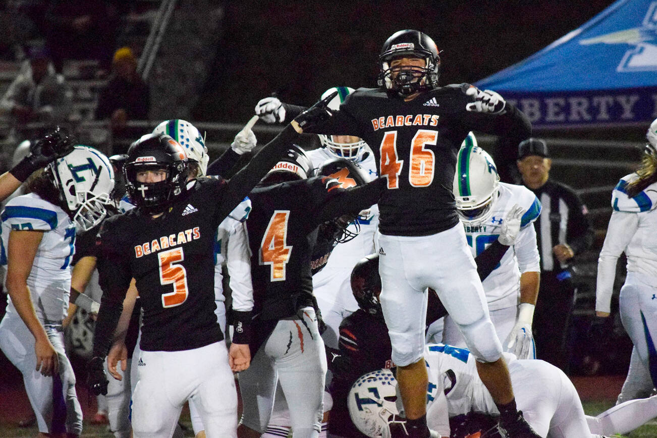 Monroe sophomore Aiden Boldt celebrates after Monroe recovers a Liberty fumble on Friday, Nov. 4, 2022 at Monroe High School in Monroe, Washington. (Katie Webber / The Herald)