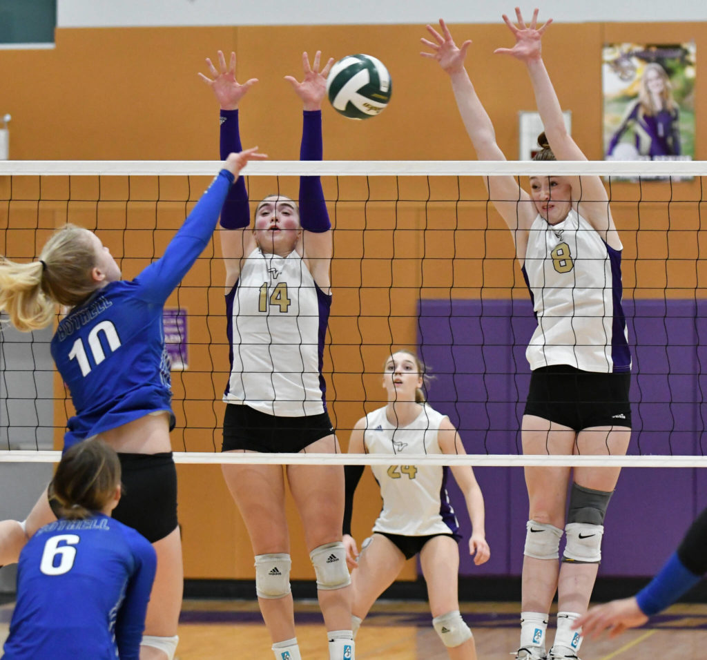 Lake Stevens’ Jamie Call and Peri Hoshock jump to block a shot during a 4A District 1/2 Tournament match against Bothell on Nov. 8, 2022, in Lake Stevens. (John Gardner / Pro Action Image)
