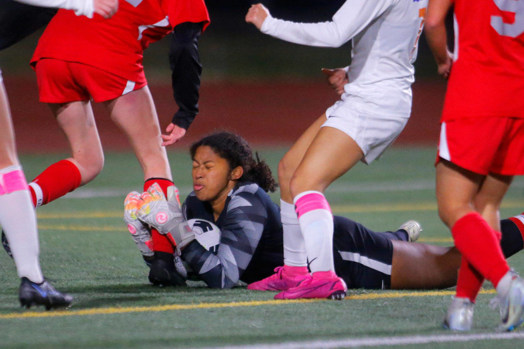 Mountlake Terrace’s Sierra Sonko makes a save on a loose ball in the final minutes against Auburn Mountainview on Wednesday, Nov. 9, 2022, Edmonds District Stadium in Edmonds, Washington. (Ryan Berry / The Herald)
