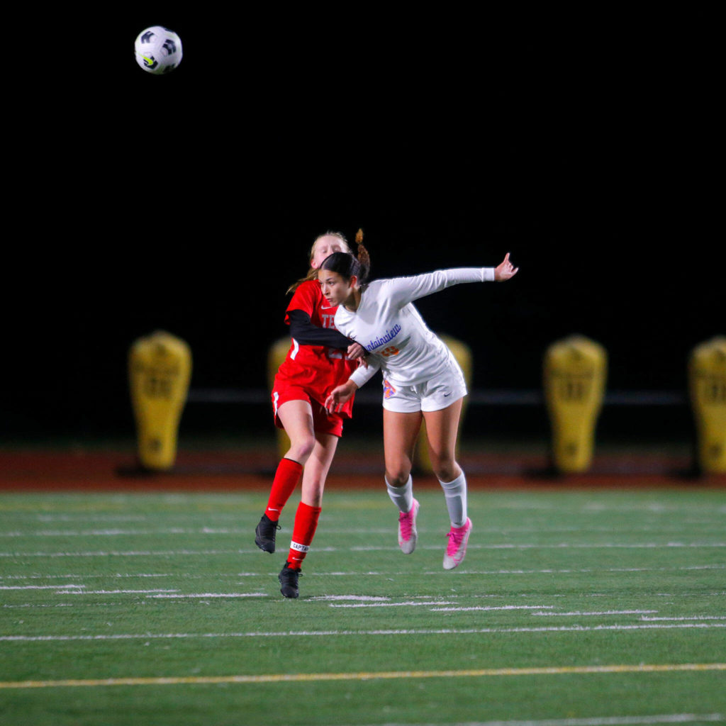 Auburn Mountainview’s Noella Abeyta tries to head a goal kick to a teammate against Mountlake Terrace on Wednesday, Nov. 9, 2022, Edmonds District Stadium in Edmonds, Washington. (Ryan Berry / The Herald)
