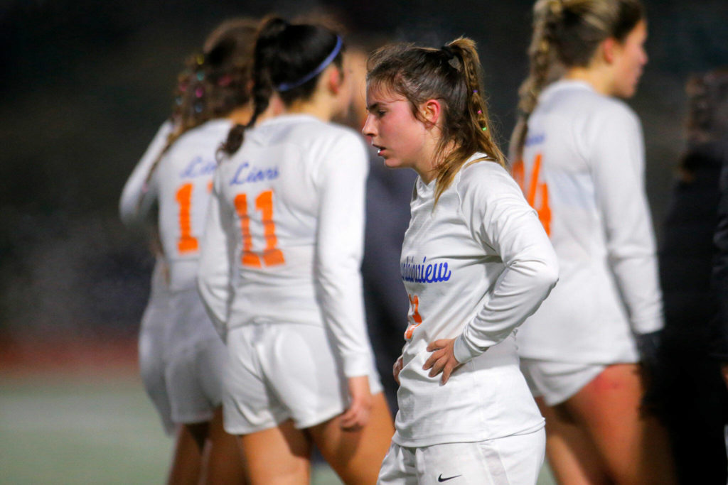 Auburn Mountainview’s Lily McMullen stands in silence after a tournament loss against Mountlake Terrace on Wednesday, Nov. 9, 2022, Edmonds District Stadium in Edmonds, Washington. (Ryan Berry / The Herald)
