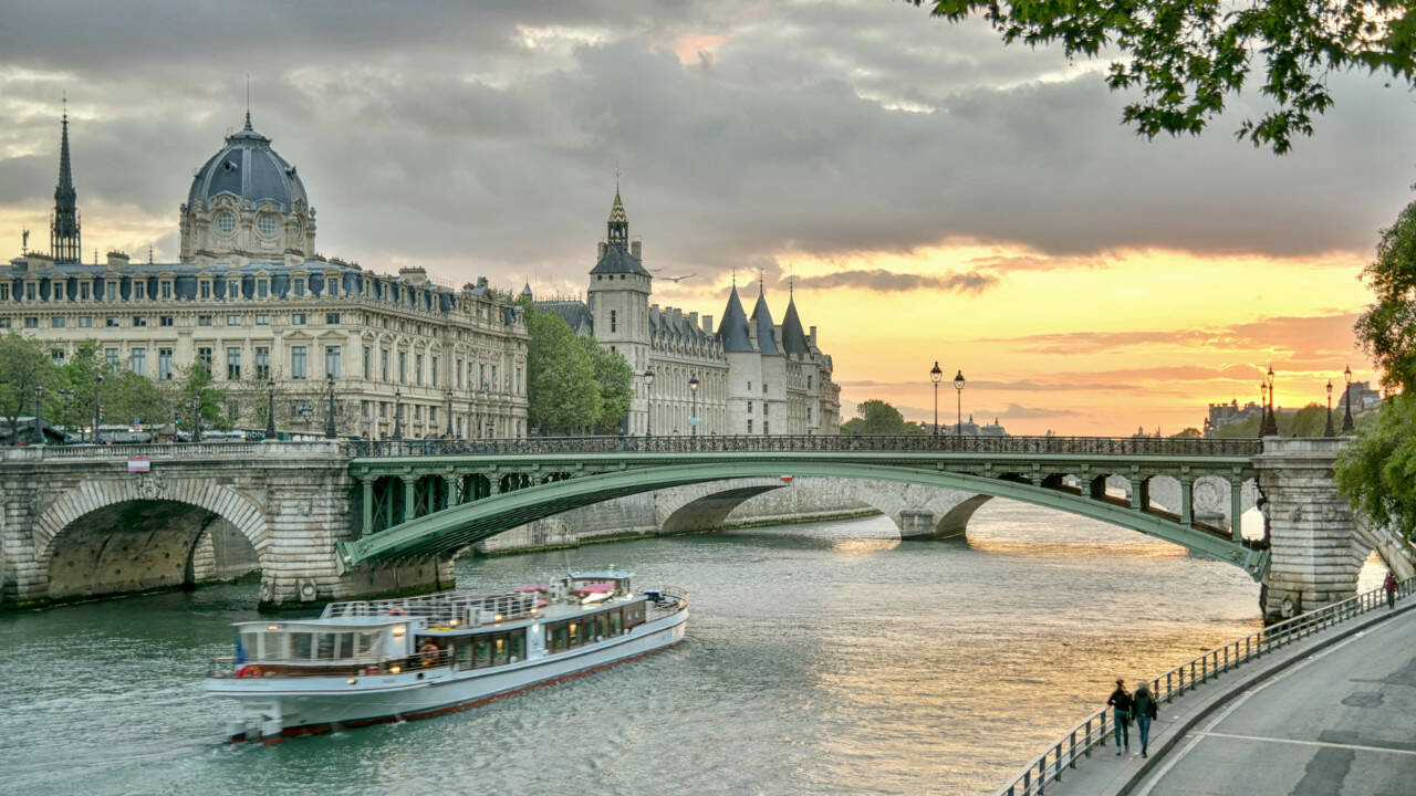 A sunset stroll along the Seine River is one of Paris’ most romantic experiences.