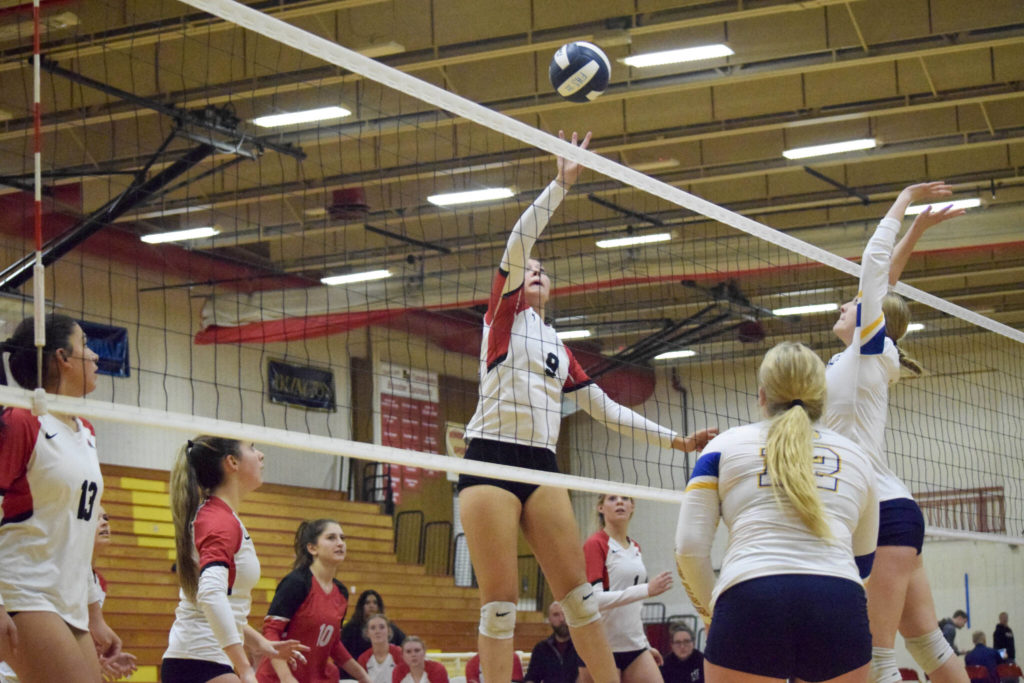 Snohomish sophomore Tyler Gildersleeve-Stiles tips the ball over the net during a 3A District 1 Tournament semifinal match against Ferndale on Thursday, Nov. 10, 2022, at Marysville Pilchuck High School. (Katie Webber / For The Herald)
