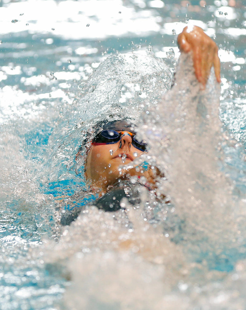 Glacier Peak freshman Keelie Sullivan swims in the 100 yard backstroke consolation heat during the WIAA 4A Girls State Swim & Dive Championships on Saturday, Nov. 12, 2022, at the Weyerhaeuser King County Aquatic Center in Federal Way, Washington. (Ryan Berry / The Herald)
