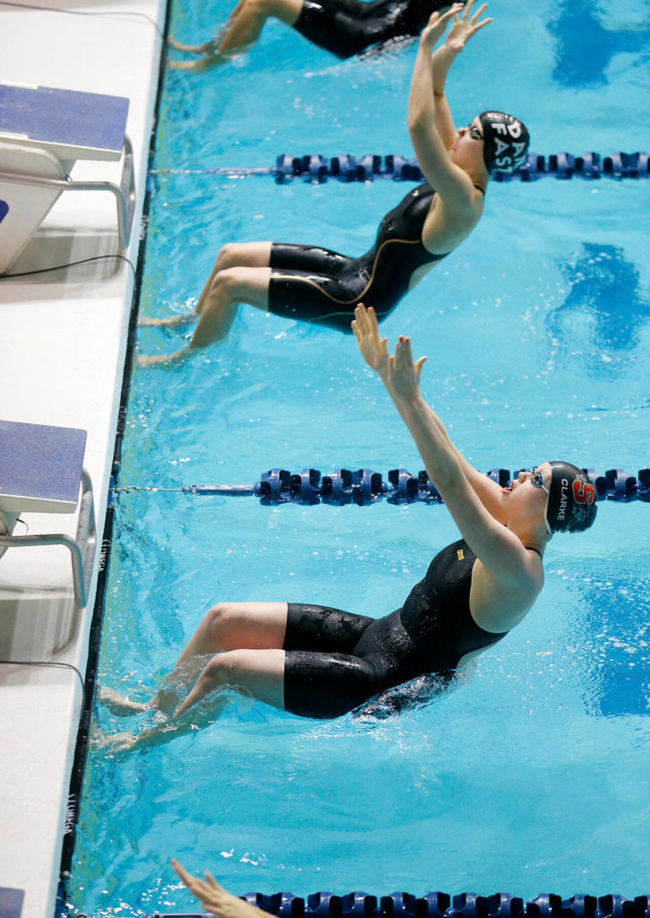 Mary Clarke, of Snohomish, kicks off the 200 yard medley relay consolation heat for her team during the WIAA 3A Girls State Swim & Dive Championships on Saturday, Nov. 12, 2022, at the Weyerhaeuser King County Aquatic Center in Federal Way, Washington. (Ryan Berry / The Herald)
