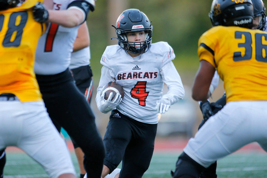 Monroe’s Gavin Ranz tries to find his way into the end zone during a playoff matchup against Lincoln High on Saturday, Nov. 12, 2022, at the Lincoln Bowl in Tacoma, Washington. (Ryan Berry / The Herald)
